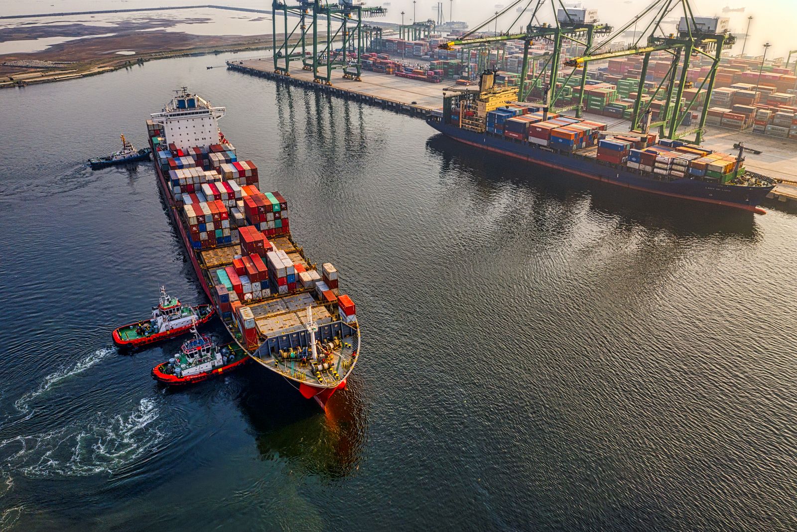 Aerial view of a container ship crossing open ocean